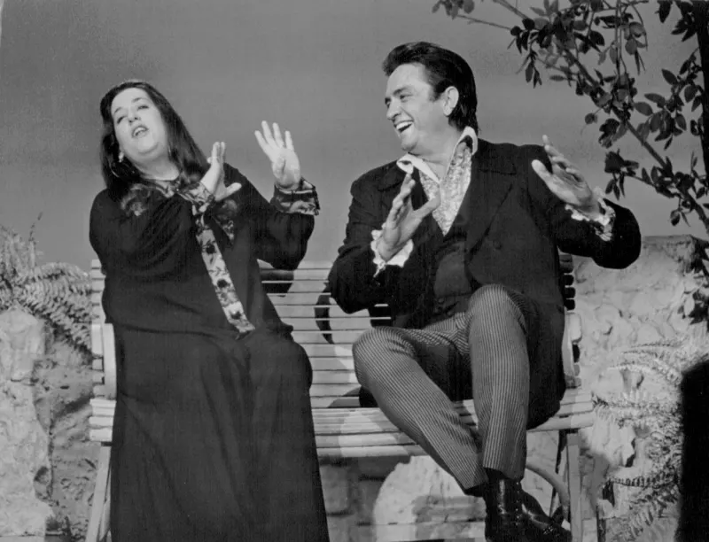Johnny Cash with Cass Elliot on the set of The Johnny Cash Show, 1969