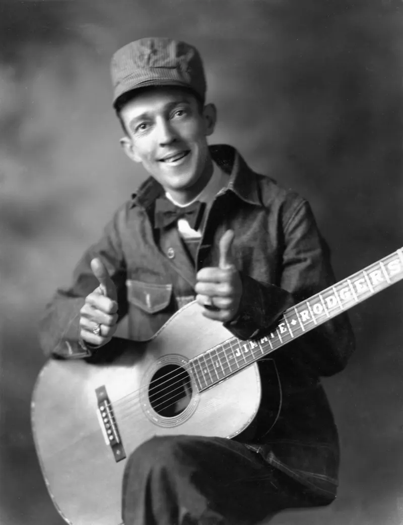 Jimmie Rodgers, the Singing Brakeman, with his guitar in 1931