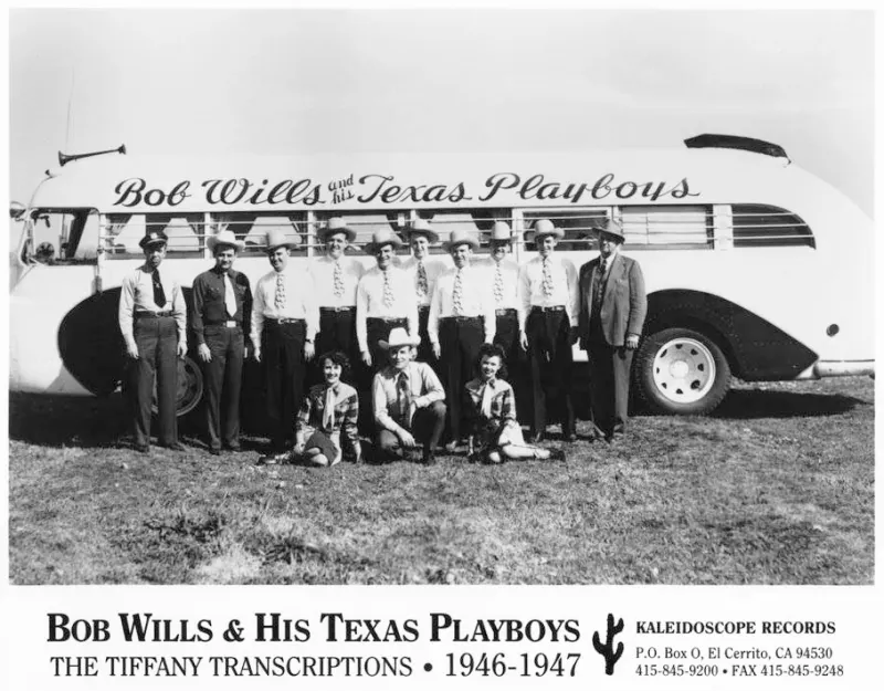 Bob Wills and His Texas Playboys in front of their tour bus